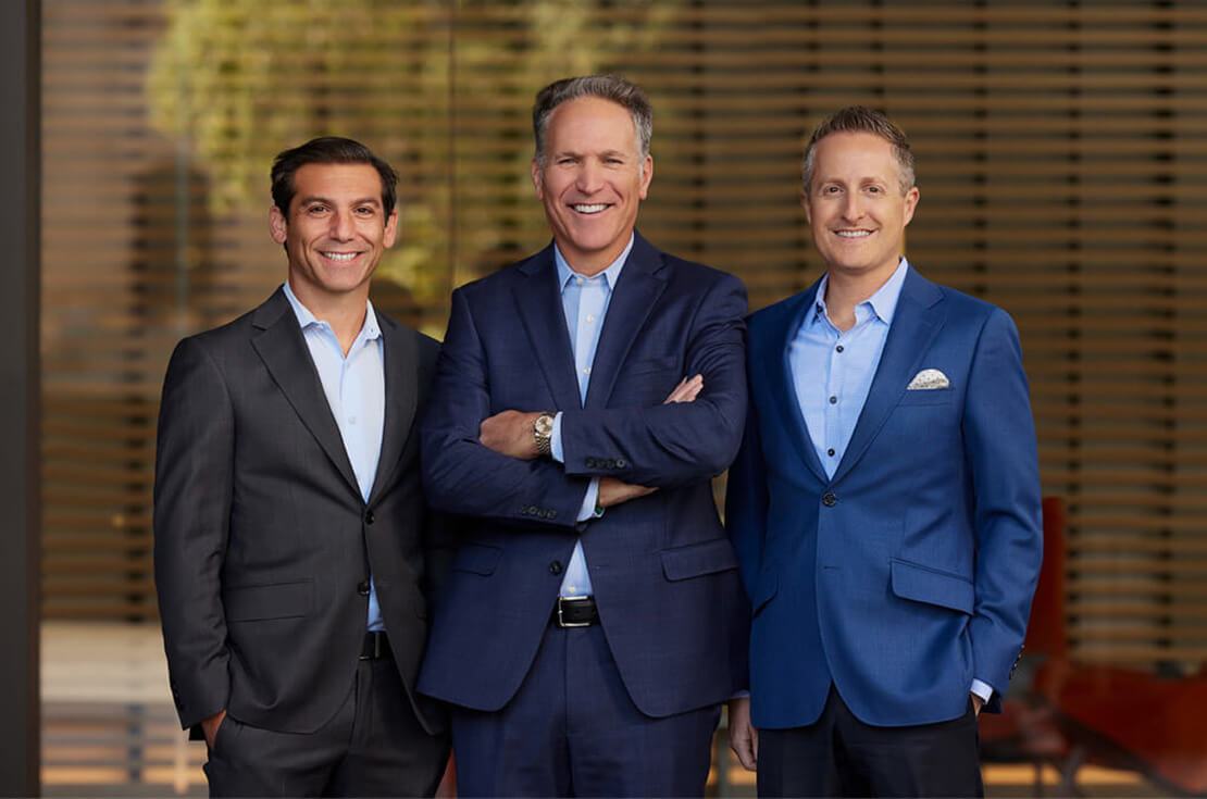 Trapani, Calvert and Meyer Wealth Management partners standing together
