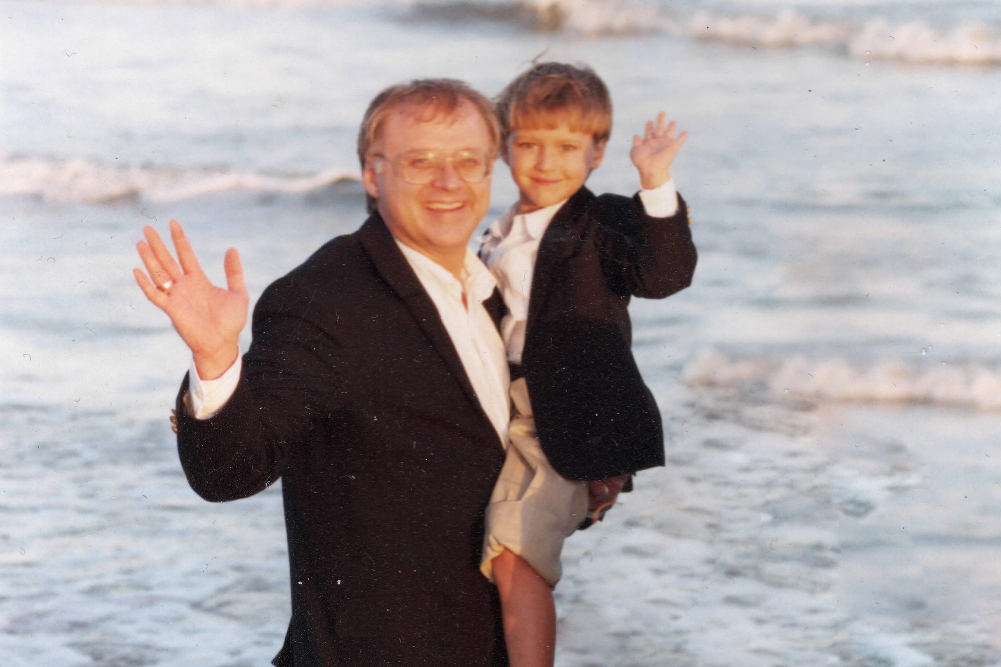 Merrell holding Samuel as a child