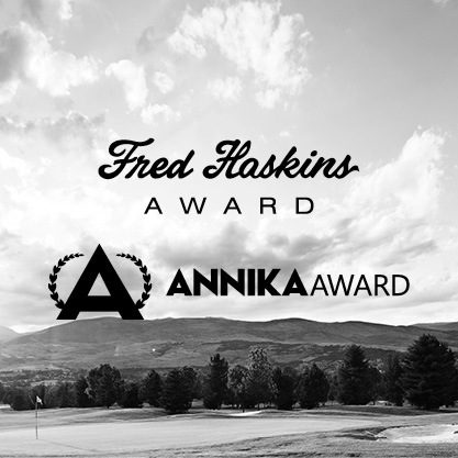 Black and white image of a golf course with black AnnikaAward and Haskins Award logos on top