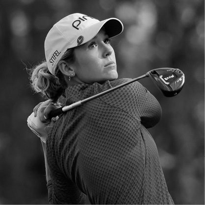 Black and white image Rachel Heck swinging golf club