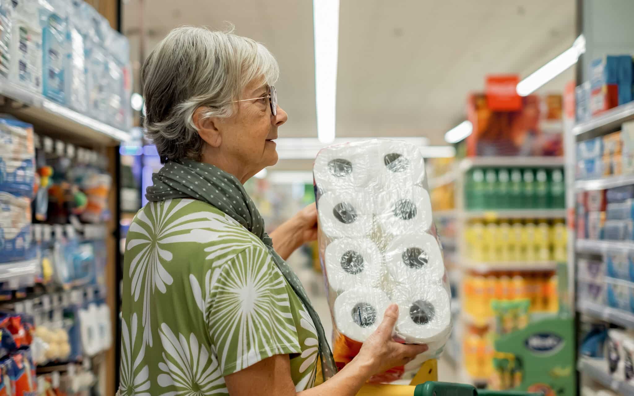 Riverside-CMG-senior-woman-shopping-in-supermarket-inflation-concept.jpeg