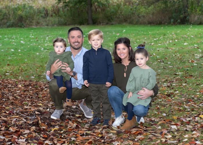 Matt Ward's family outside during autumn