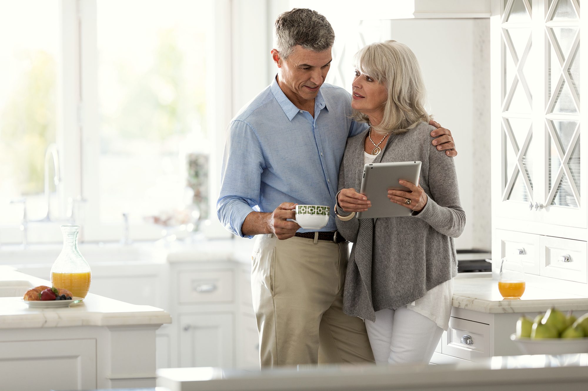 couple looking at tablet