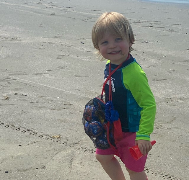 Grandson at beach walking age 3