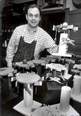 old pic man in workshop