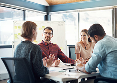 Business people gathering to make an agreement.