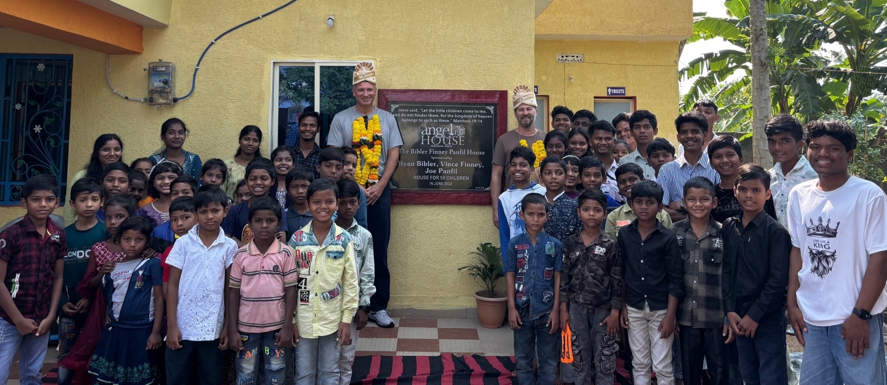 Ryan with the children in India