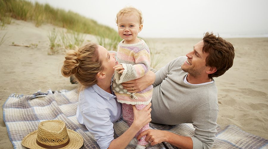 young family at the beach