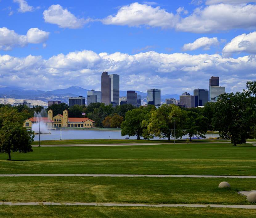 Denver Colorado skyline over Ferril Lake & Four Corners Financial Advisors