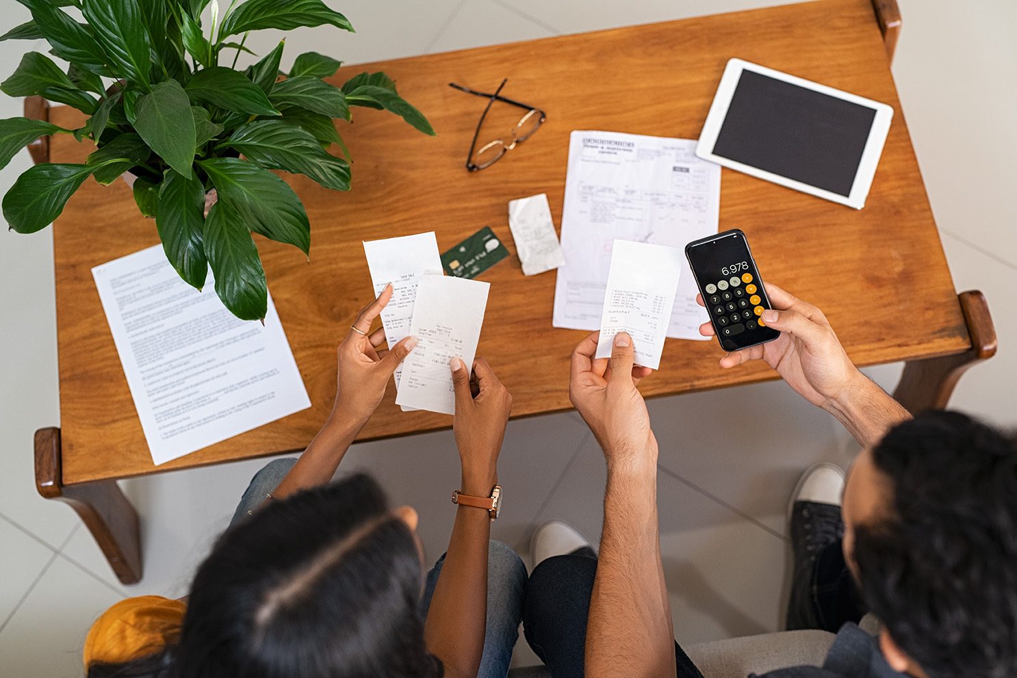 Couple budgeting together and managing household finances in Sunbury OH with financial planning support