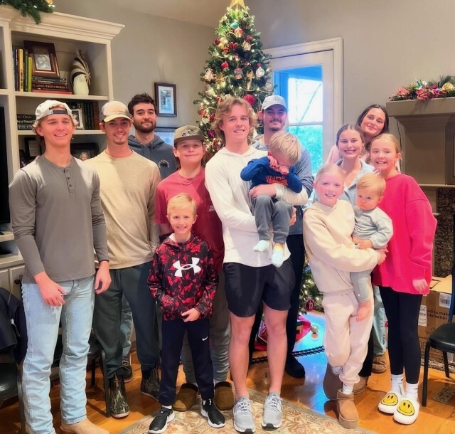 Nick and extended family pose for a Christmas photo