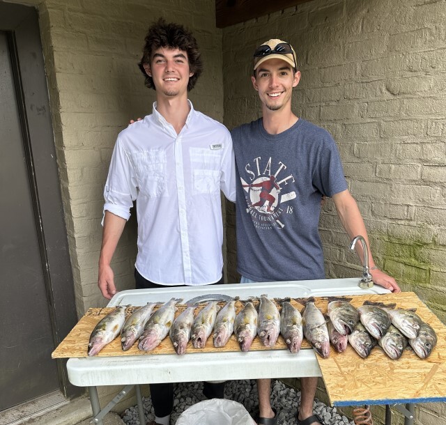 Nick and a friend cleaning fish