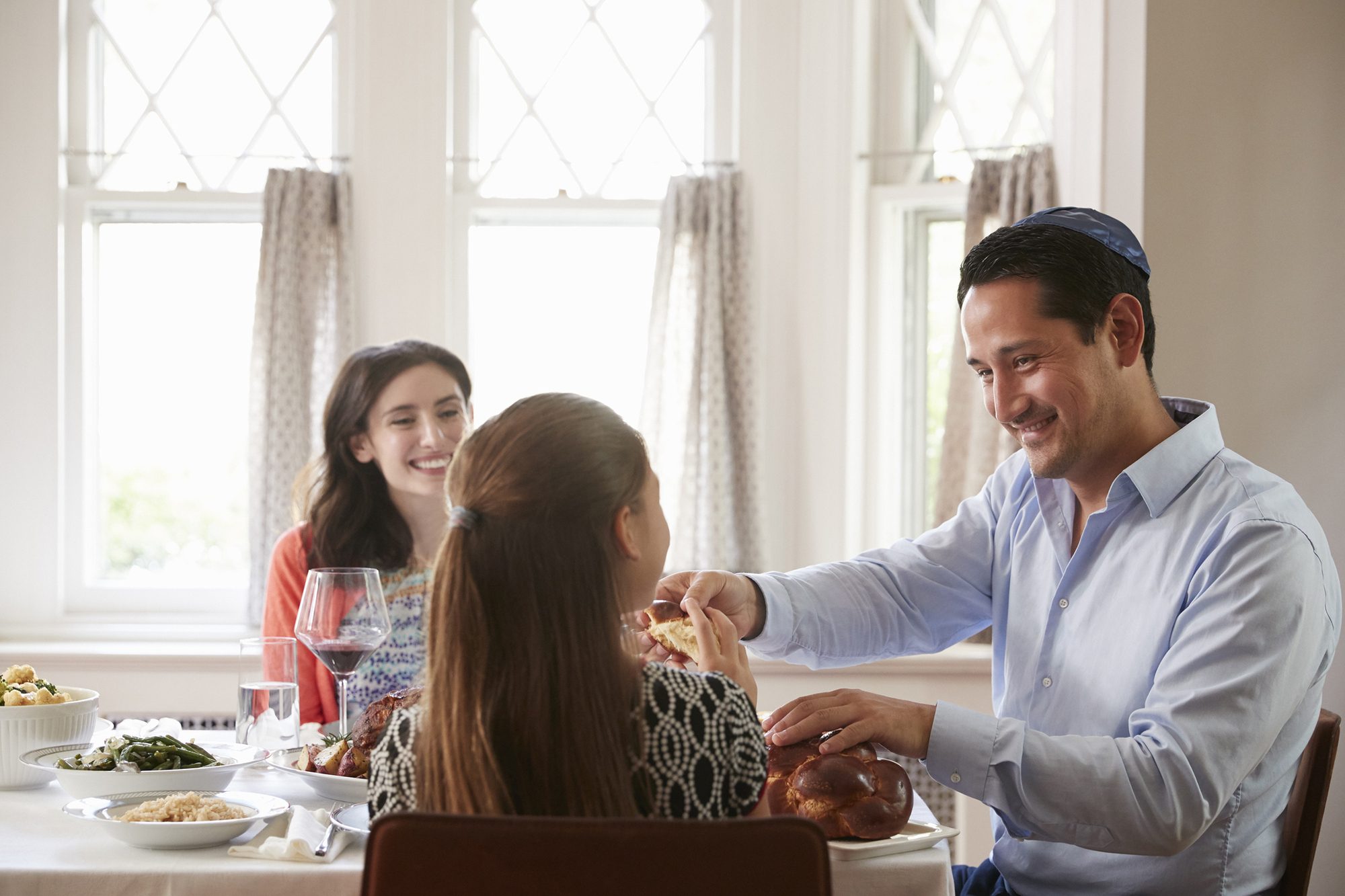 Jewish family at dinner table